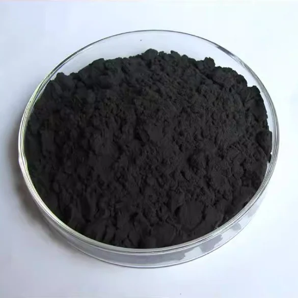 Black graphene nanoplatelets powder in a clear glass dish